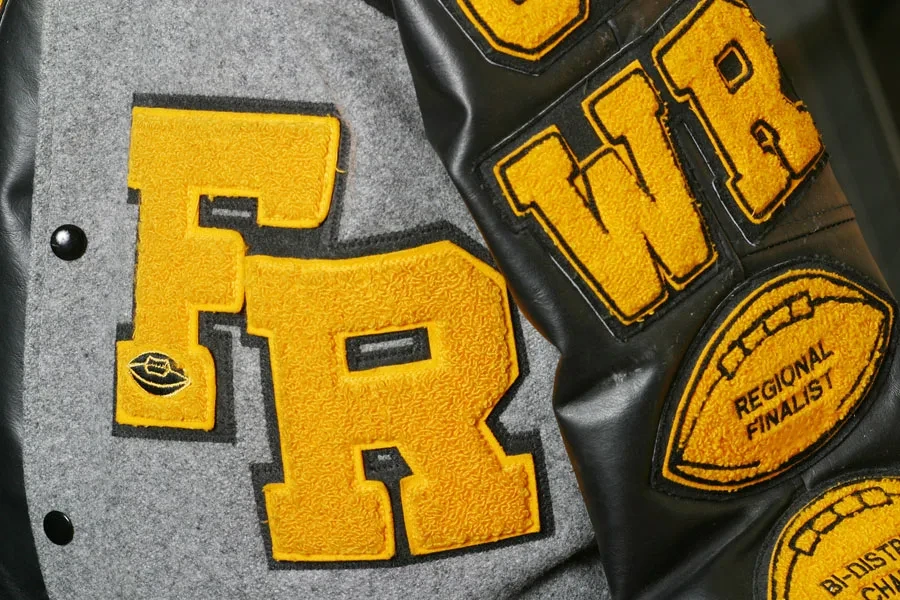 A close-up shot of a varsity jacket