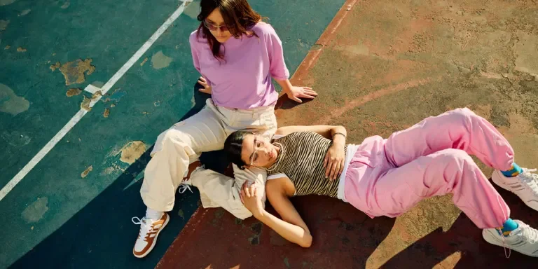 Two women hanging out in streetwear