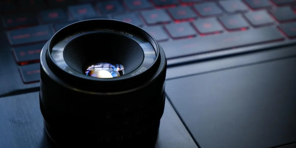 A camera lens on a laptop