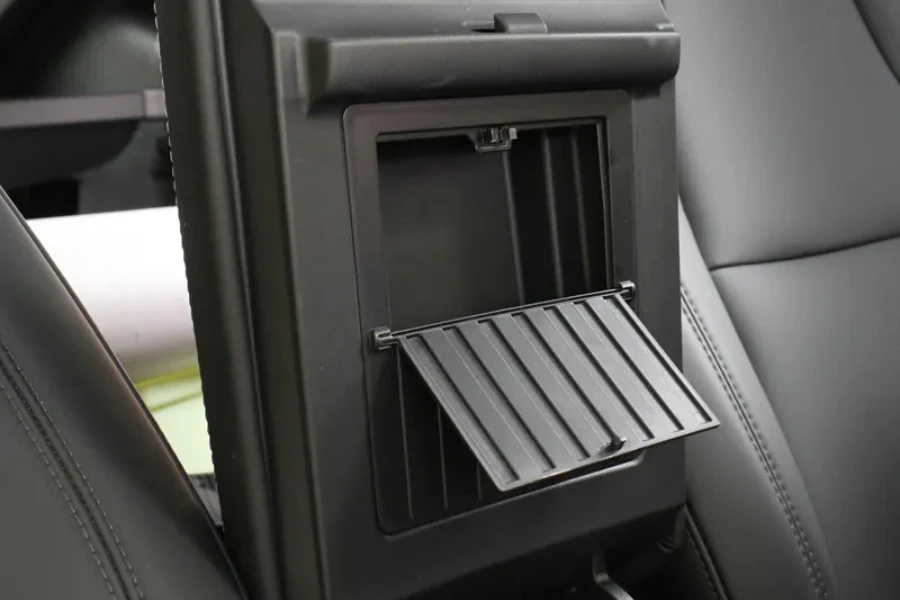 A gray center console Tesla car organizer