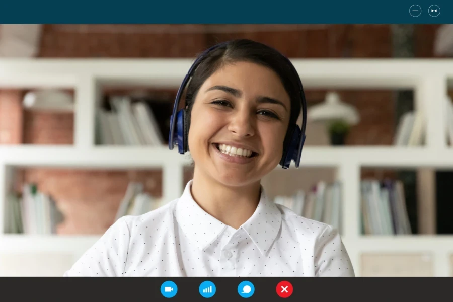 A woman using a webcam with good resolution for her online meeting