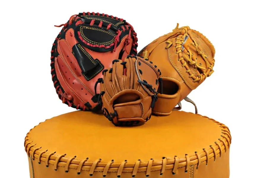 Baseball fielding glove with a blocking pad