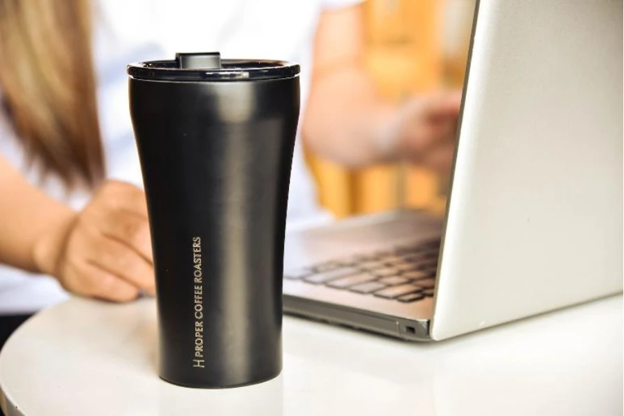 Large black coffee tumbler with sippy lid