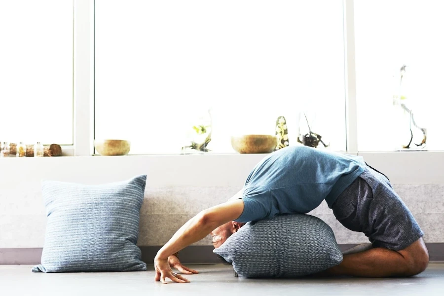 Man doing a backbend yoga position