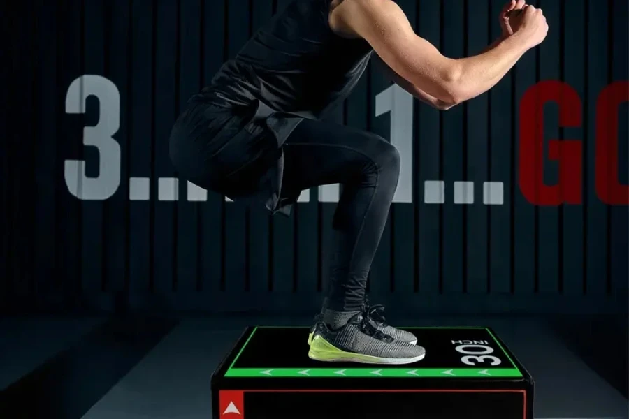 Man jumping on a plyometric box