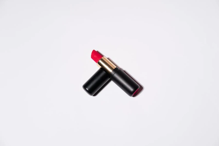 Red lipstick on a plain background