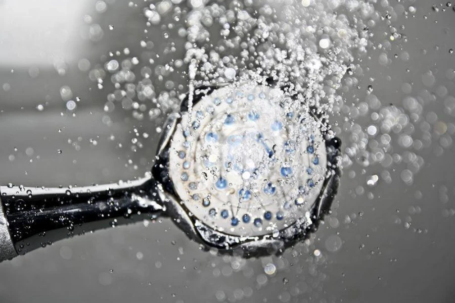 Round shower head spraying water