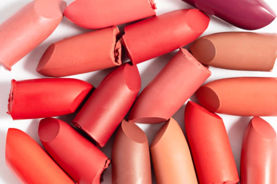 The tops of different types of lipstick