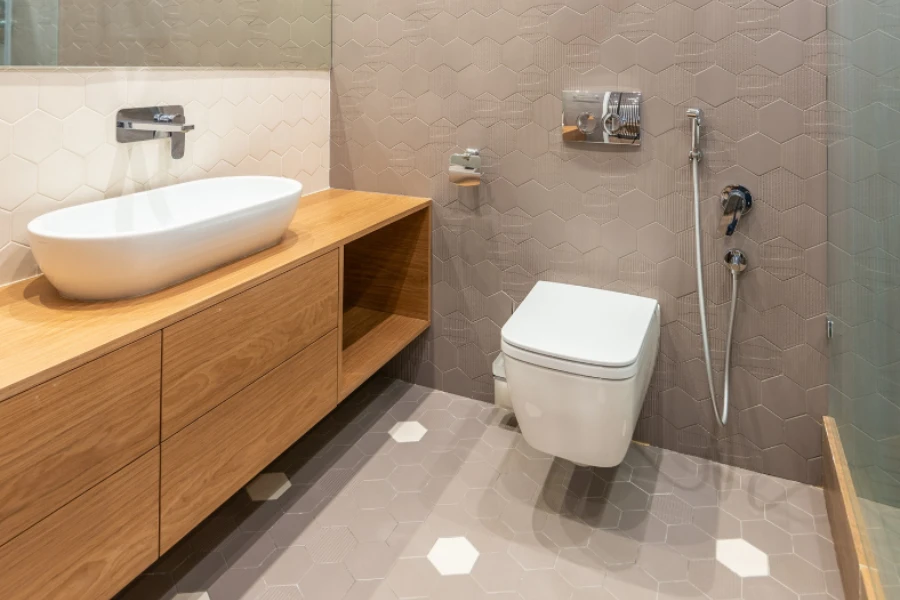 Wall mounted toilet with bidet sprayer