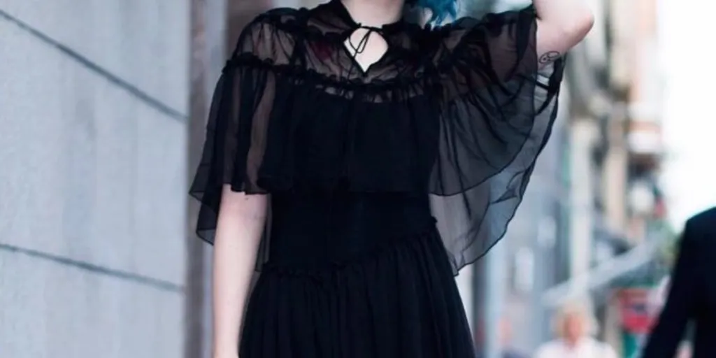 Woman in a stylish boho goth outfit