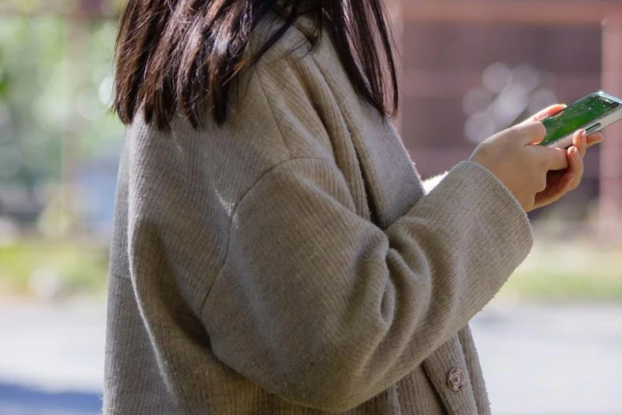 Woman in an oversized cashmere cardigan