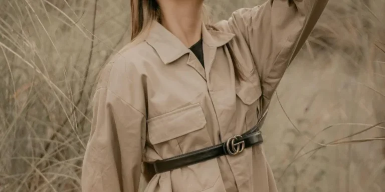 Woman posing in an oversized safari jacket