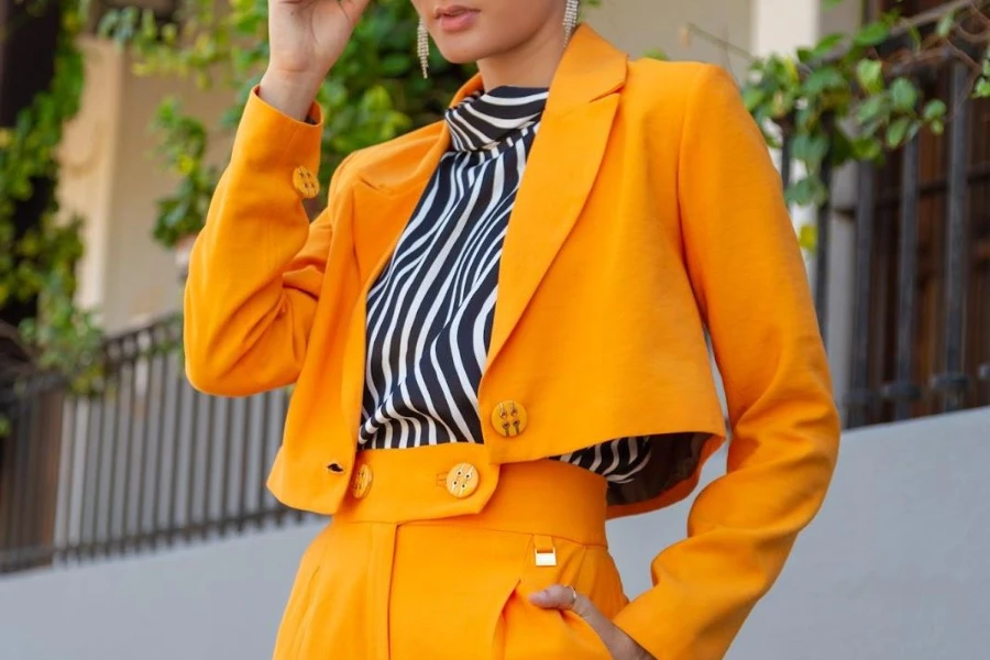 Woman pulling off a bold power suit look