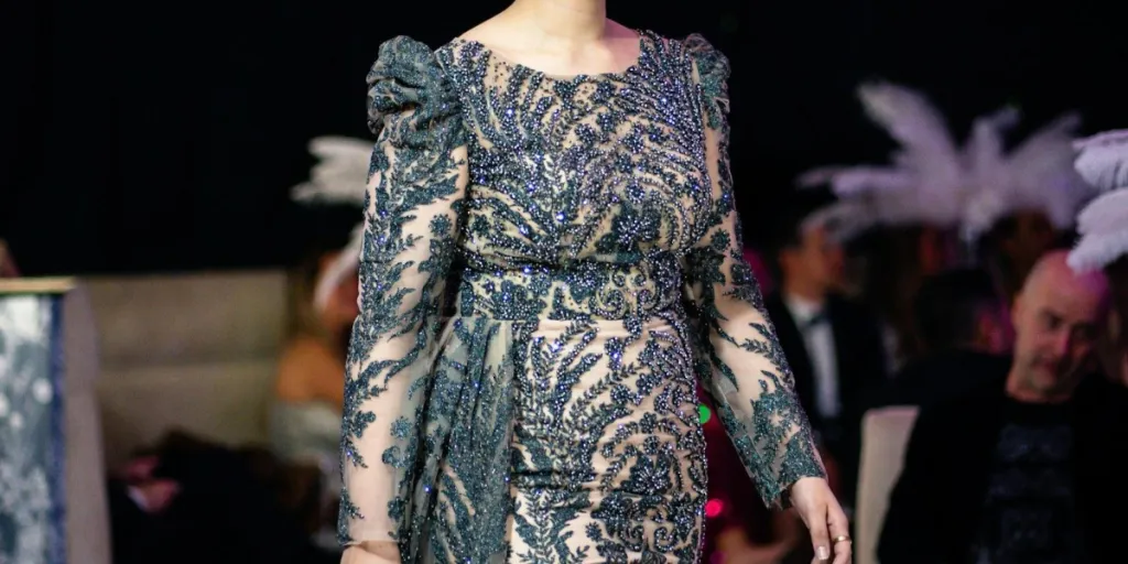 Woman showcasing an Haute Couture dress on a runway