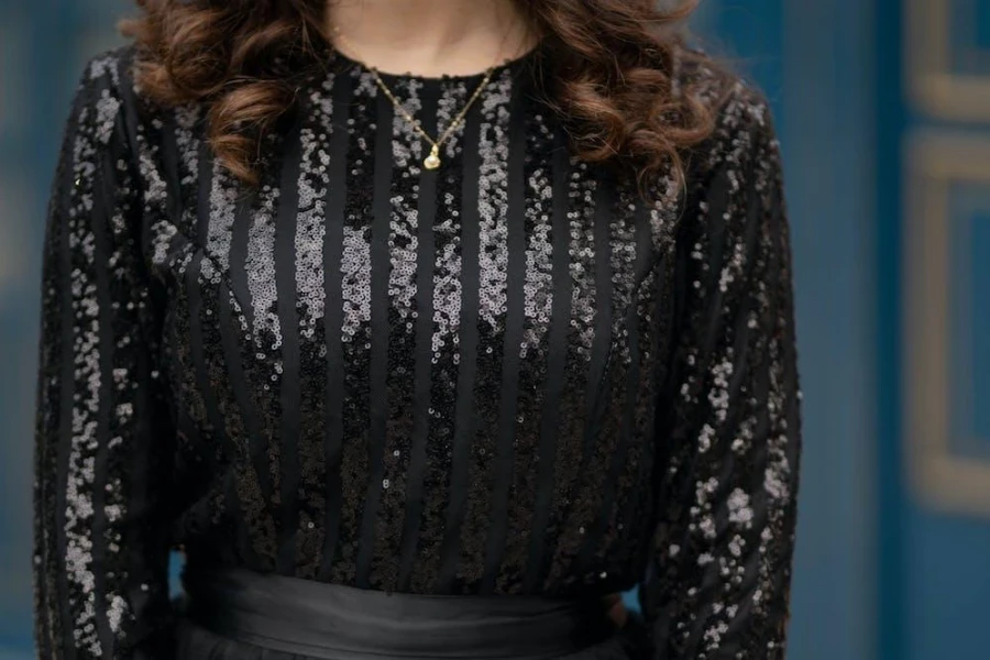 Woman wearing a black sequin dress