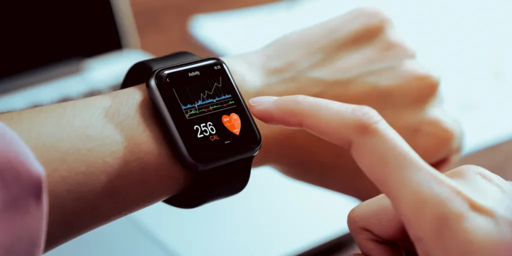 a lady touching smartwatch