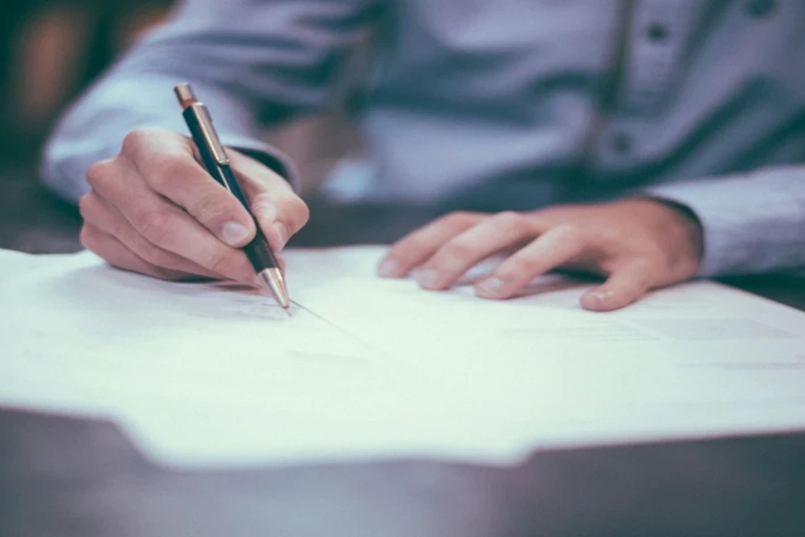 A man writing a report