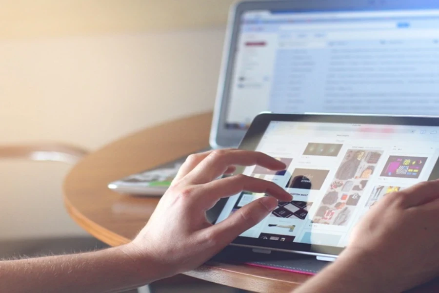 A person using an app on a tablet