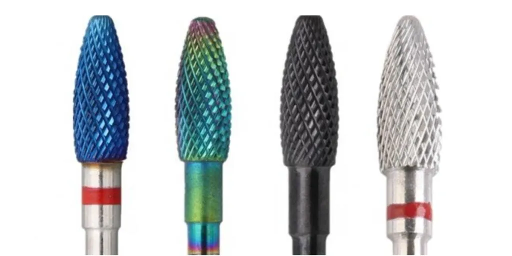 A set of different colored nail drill bits