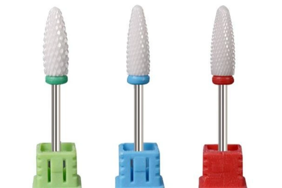 A set of three ceramic nail drill bits