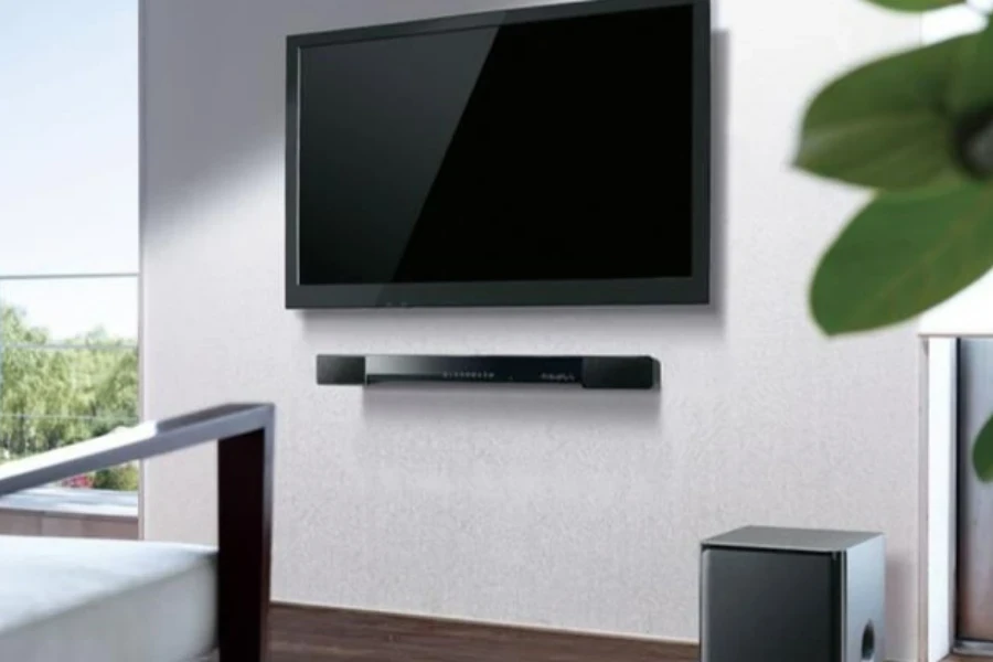 a soundbar under a hanging tv