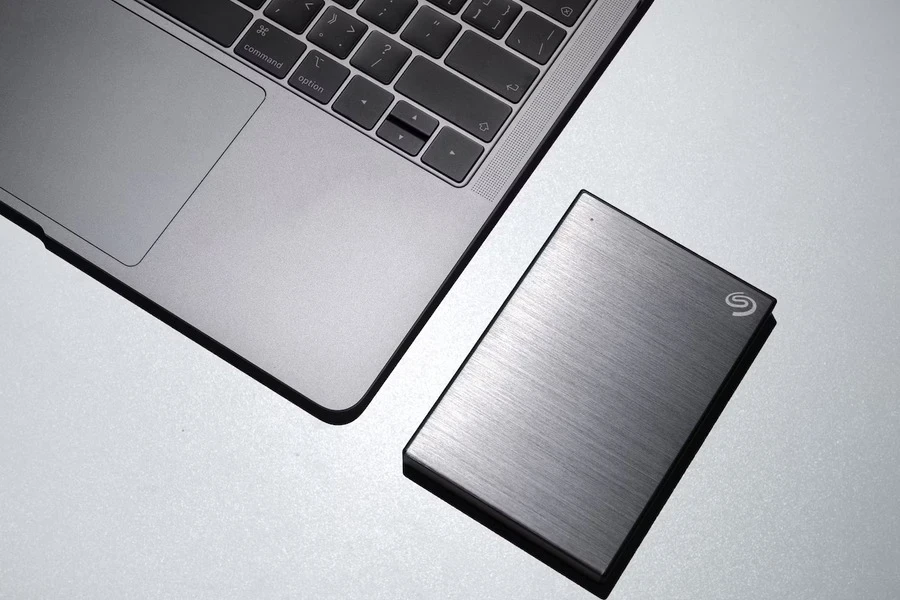 An external hard drive in a stainless steel case