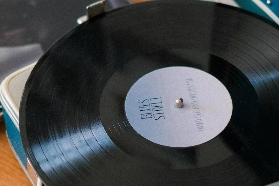 An idler wheel turntable in a blue box