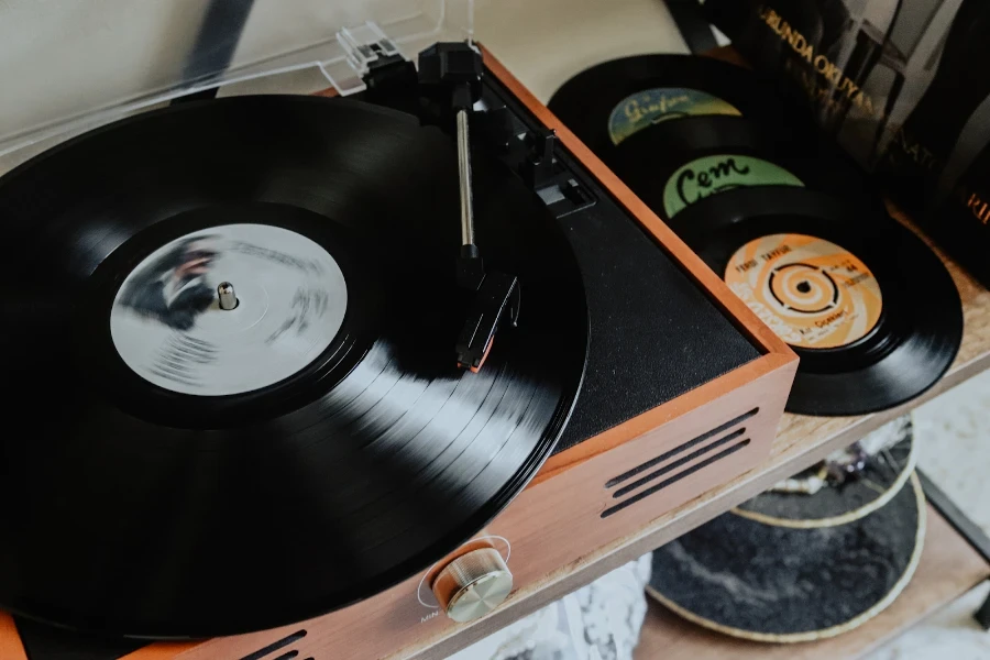 An idler wheel turntable in a brown box