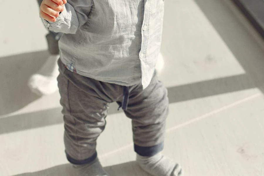 Baby boy rocking a pair of fleece pants