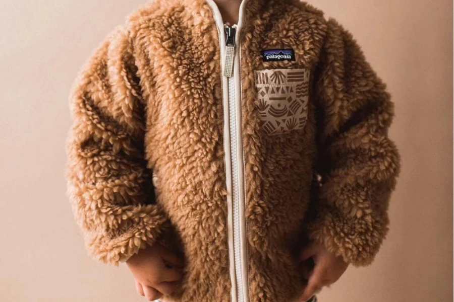 Boy rocking a brown fleece jacket