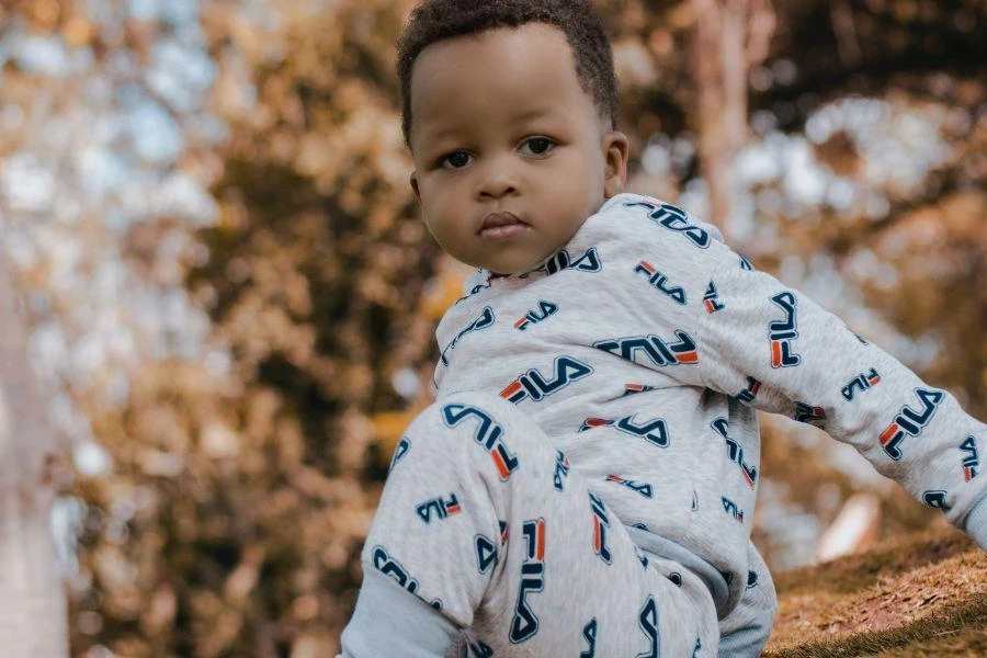 Boy stylishly posing in branded base layers