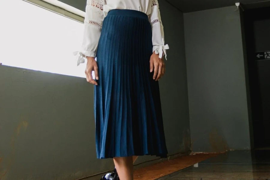 Close up picture of a blue, ruffled full skirt