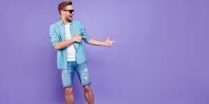 Full body size length of attractive bearded trendy stylish confident cheerful man
