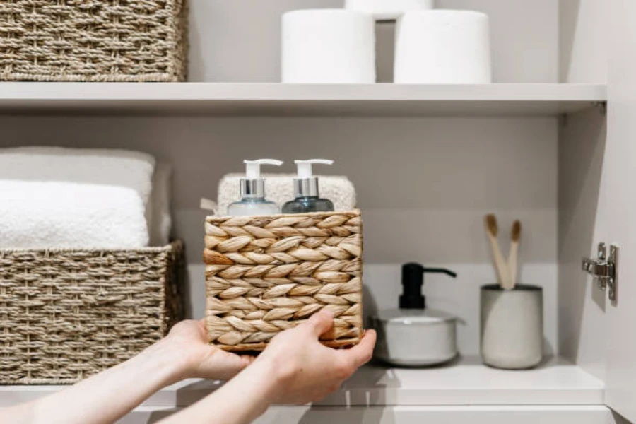 hands holding wicker basket