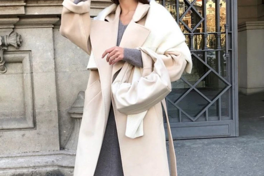 Lady stylishly donning a wool coat