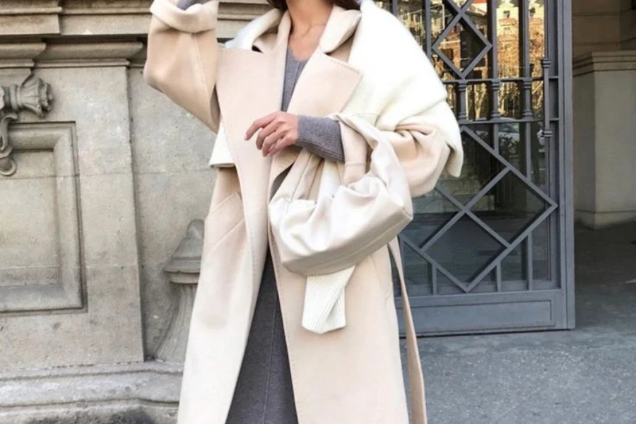 Lady stylishly donning a wool coat