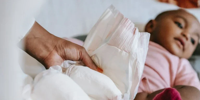 mom wears baby a safe diaper