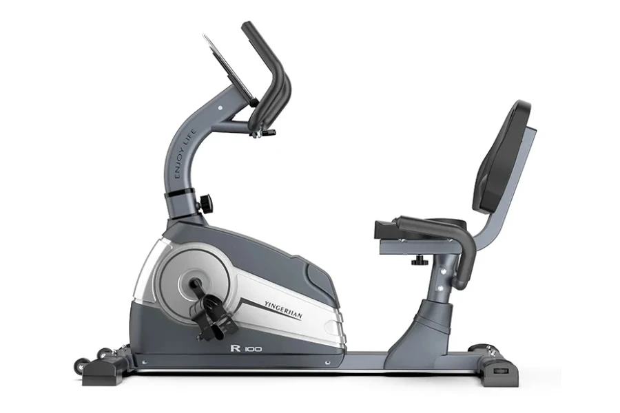 Silver and gray recumbent bike with cushioned seat