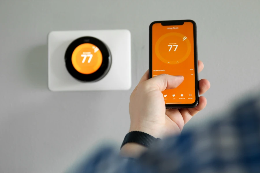 Smart thermostat being controlled by the app