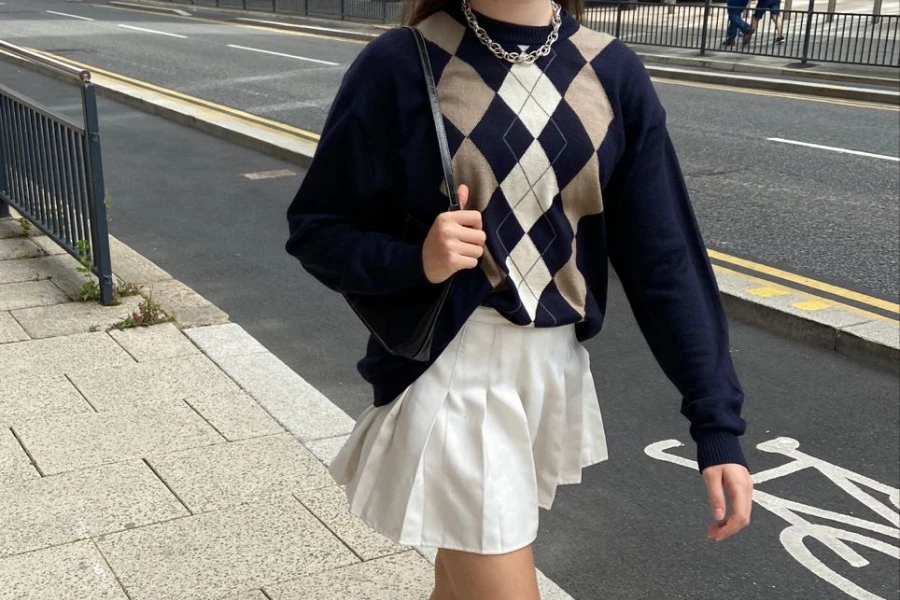 Walking woman dressed in an argyle sweater