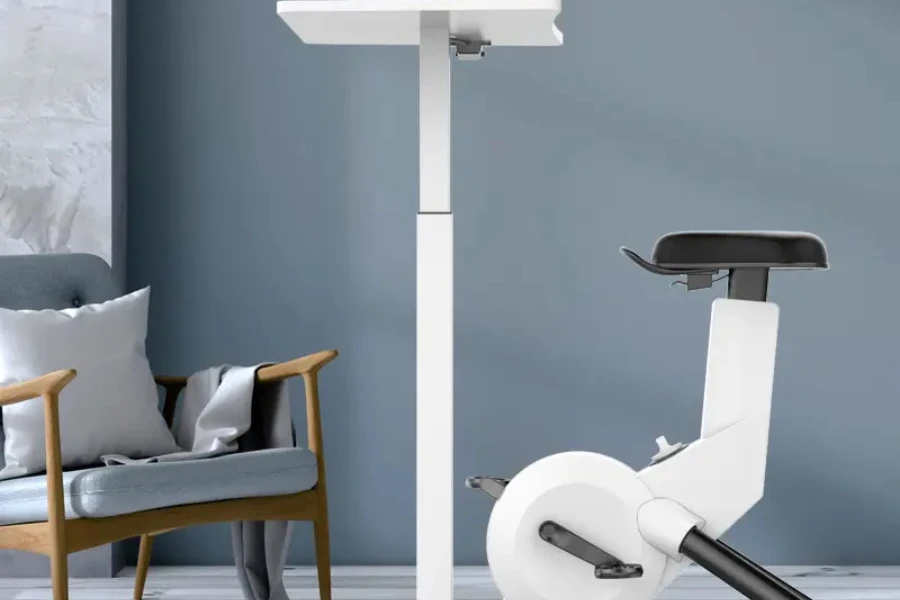 White recumbent bike with a flat desk on top