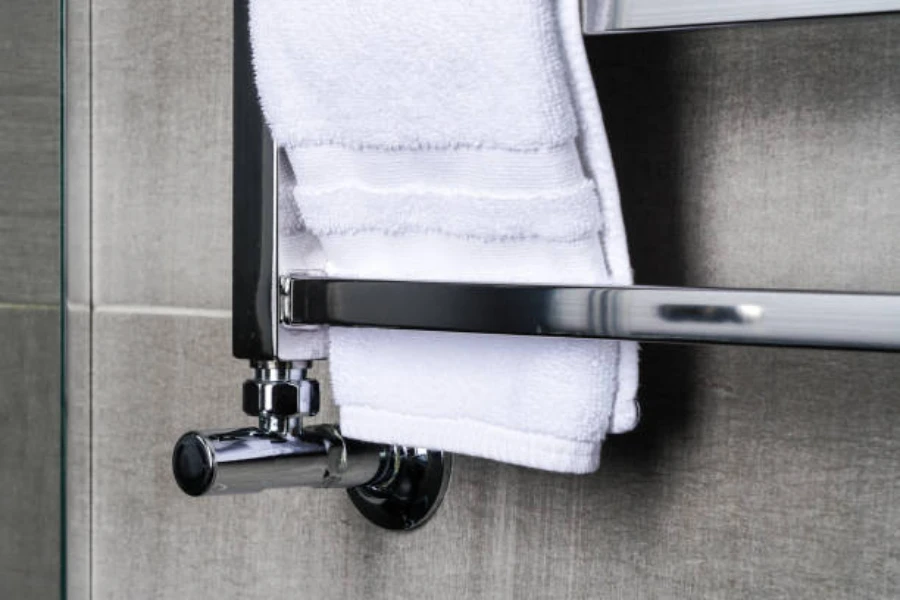 white towel close up on metal towel rail