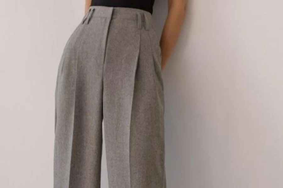 Woman rocking a pair of tailored trousers