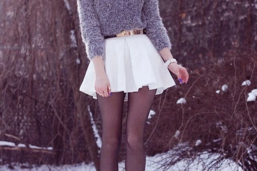 Woman wearing a sexy white skater skirt