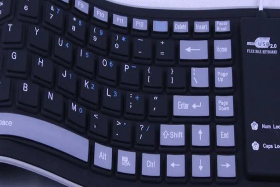 Keyboard fleksibel berwarna hitam dan abu-abu