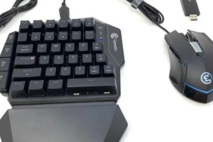 A black gaming console keyboard with a mouse