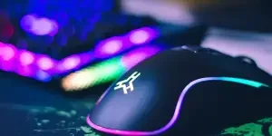 A colorful setup with an RGB gaming mouse