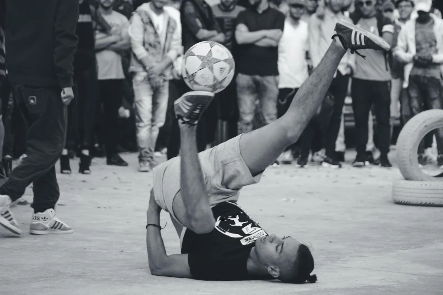 A man juggling a skills ball