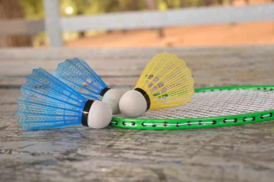 Blue and yellow glow in the dark badminton shuttlecocks
