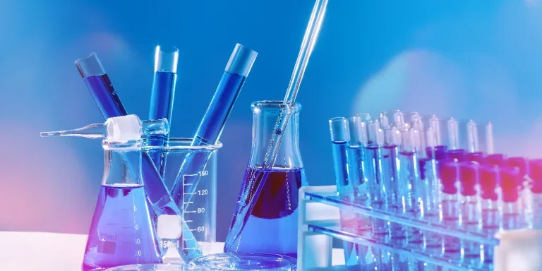 Collection of medical flasks on a blue background